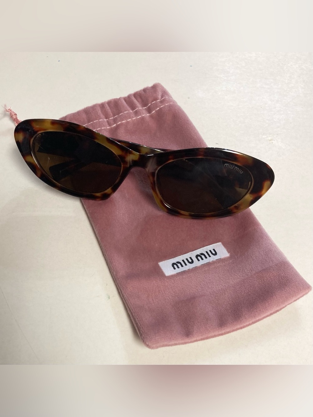 MIUMIU Tortoise Sunglasses